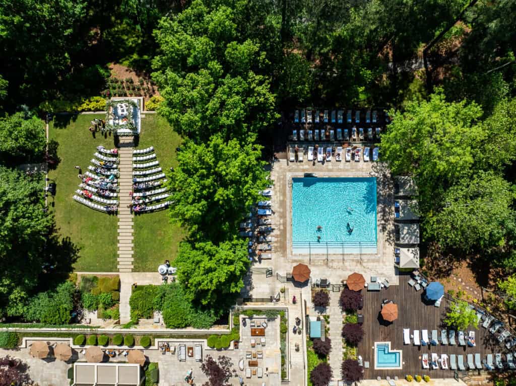 aerial view of pool and wedding in garden of umstead