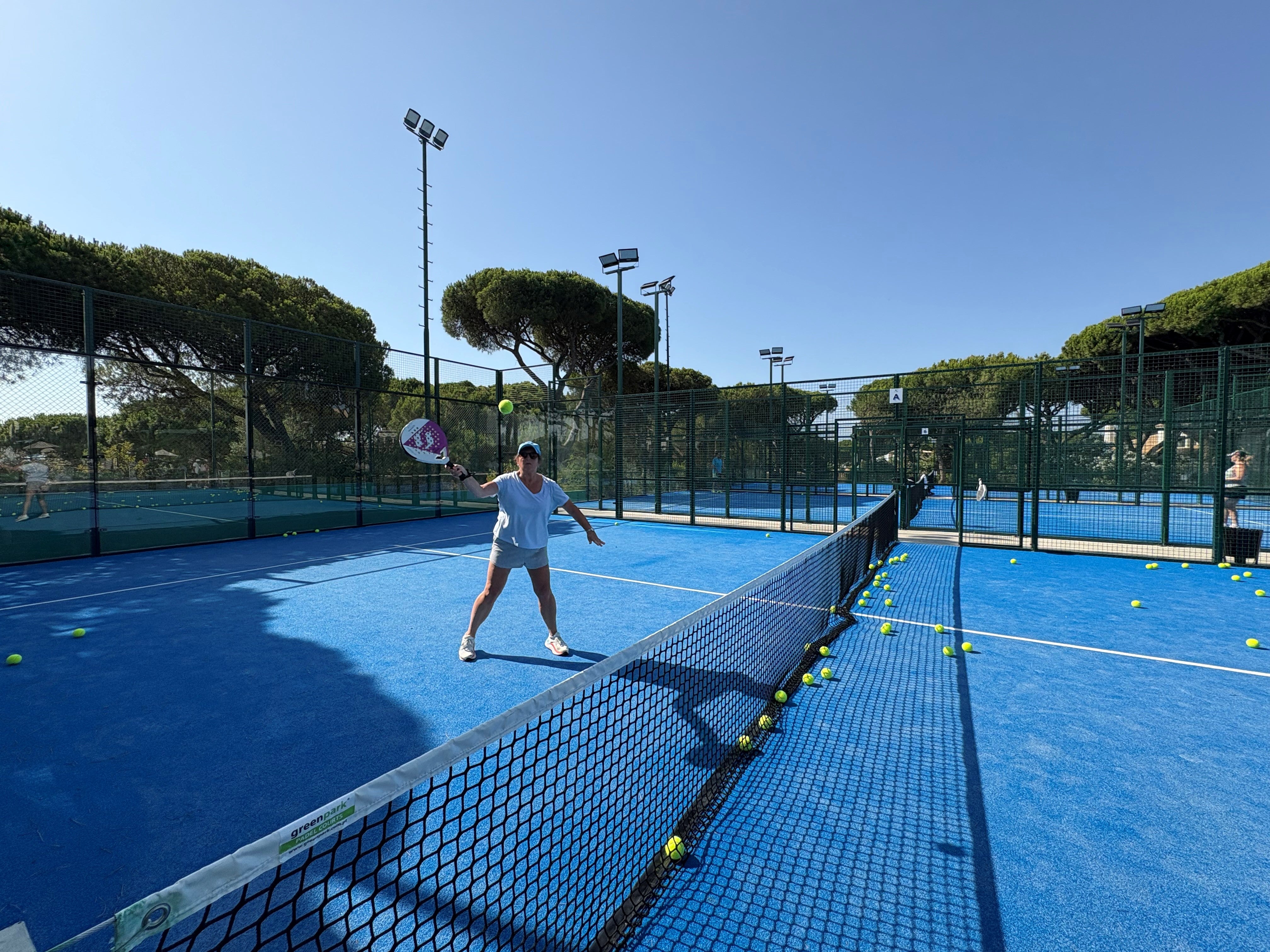 Hannah learning padel on one of the new courts at Pine Cliffs