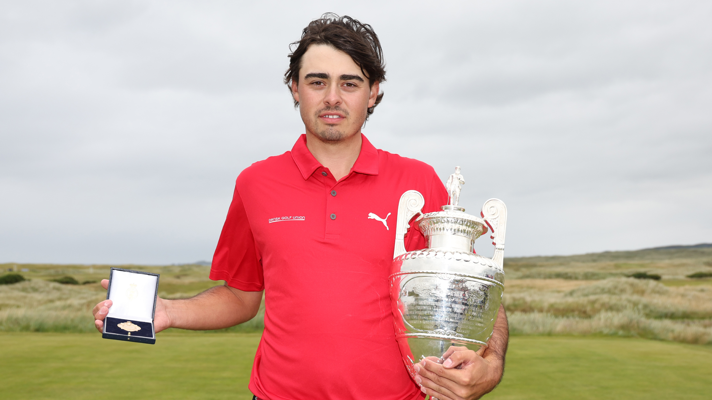 Jacob Skov Olesen with the Amateur Championship trophy