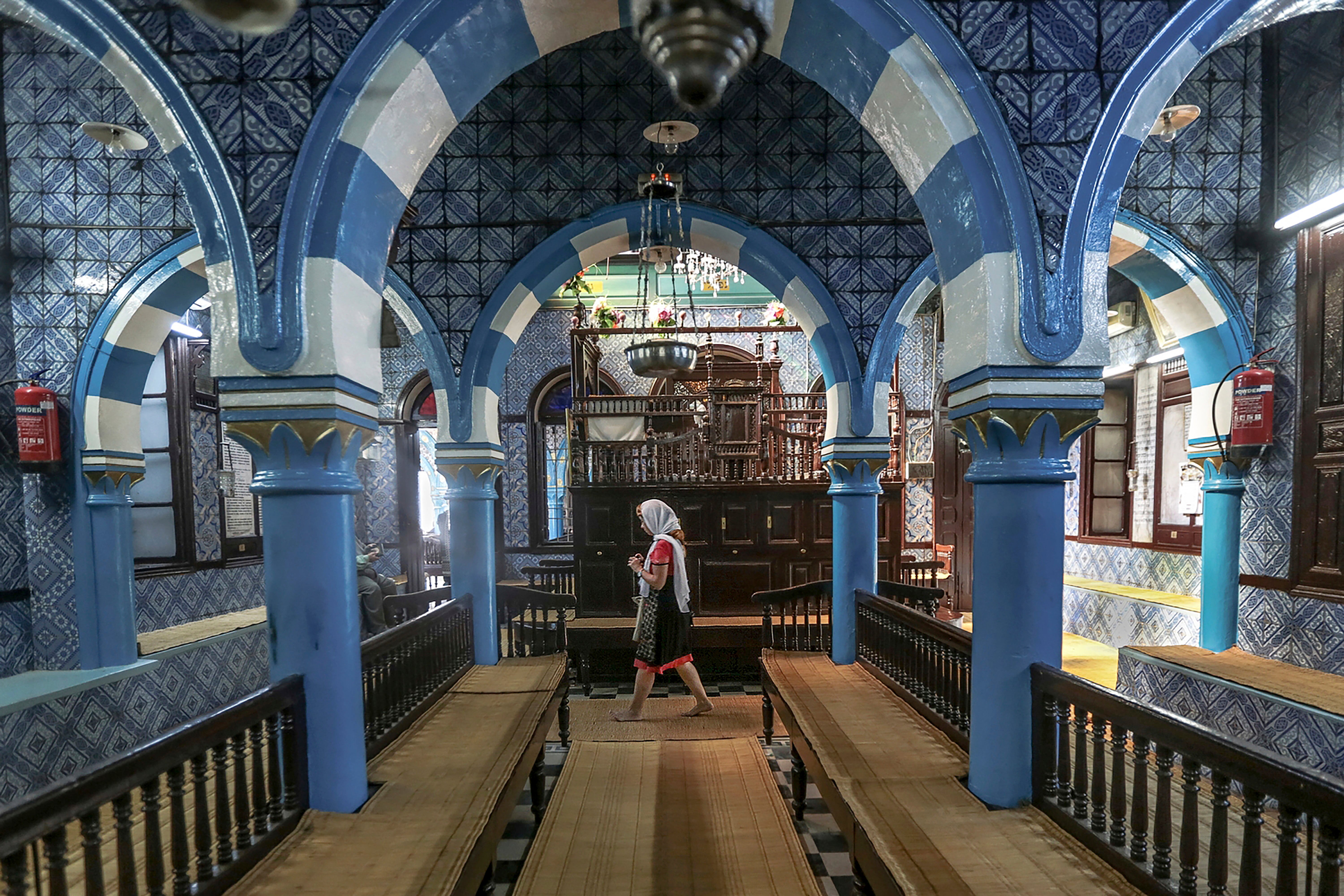 A tourist visits La Ghriba, the oldest synagogue in Africa, on the Island of Djerba