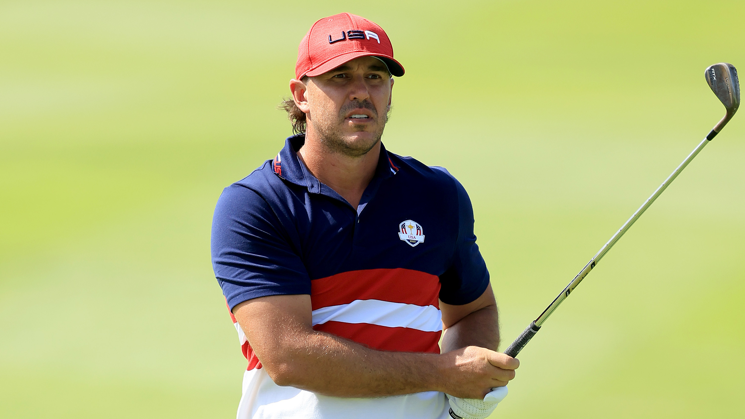 Brooks Koepka takes a shot during the 2023 Ryder Cup