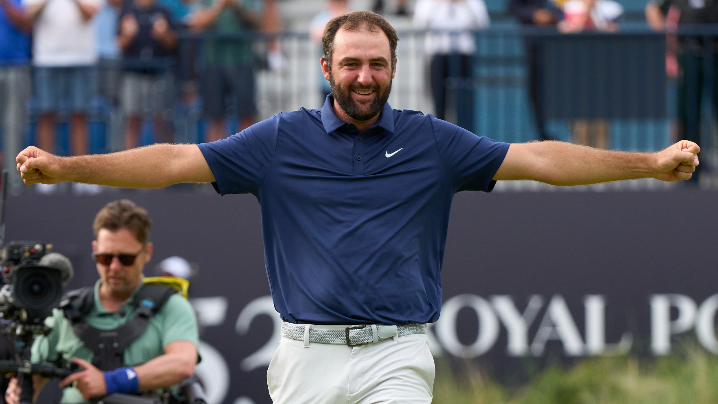 Scottie Scheffler celebrates winning The Open