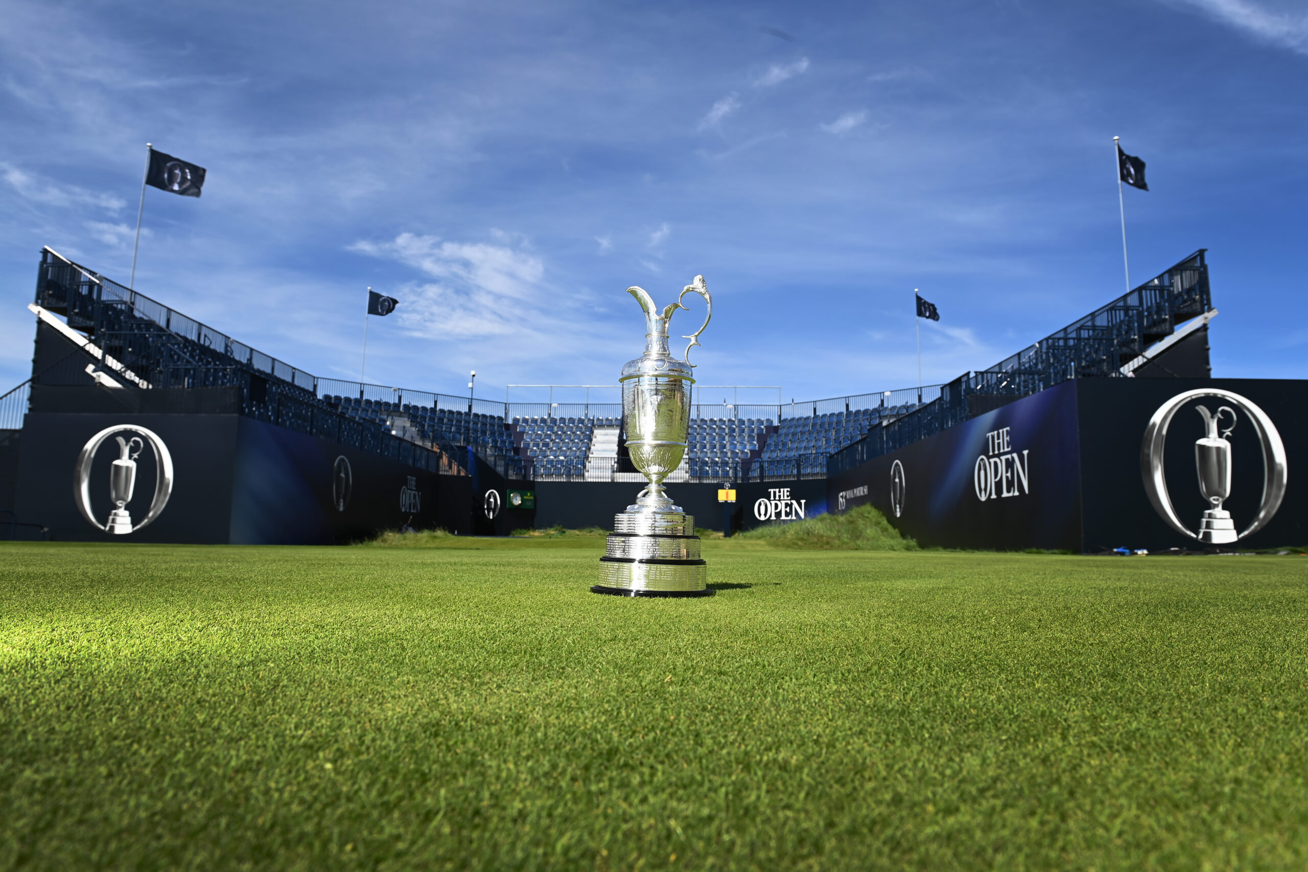 The Claret Jug in front of a grandstand