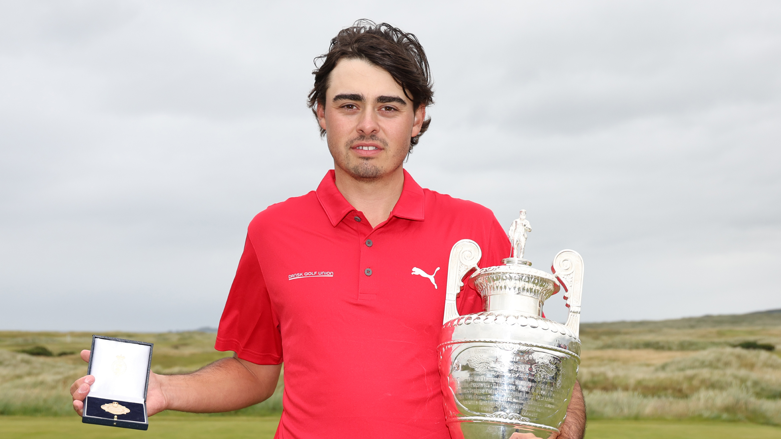 Jacob Skov Olesen with The Amateur trophy and medal