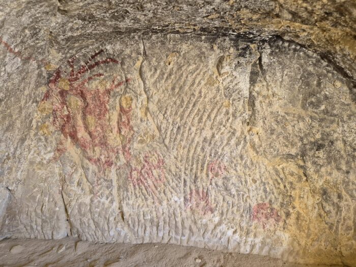 Red marks inside Matala Caves