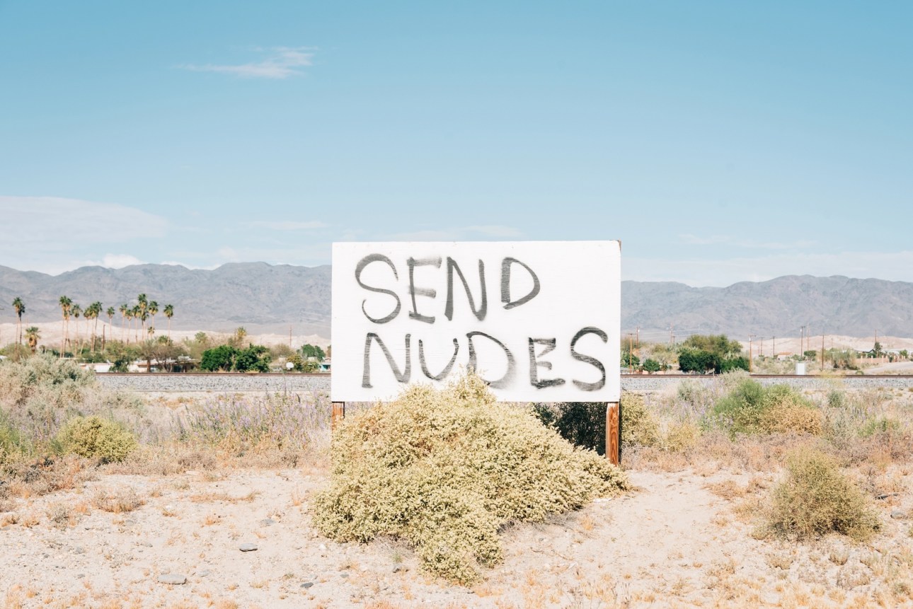 "Send nudes" sign in Mortmar, on the Salton Sea, in California