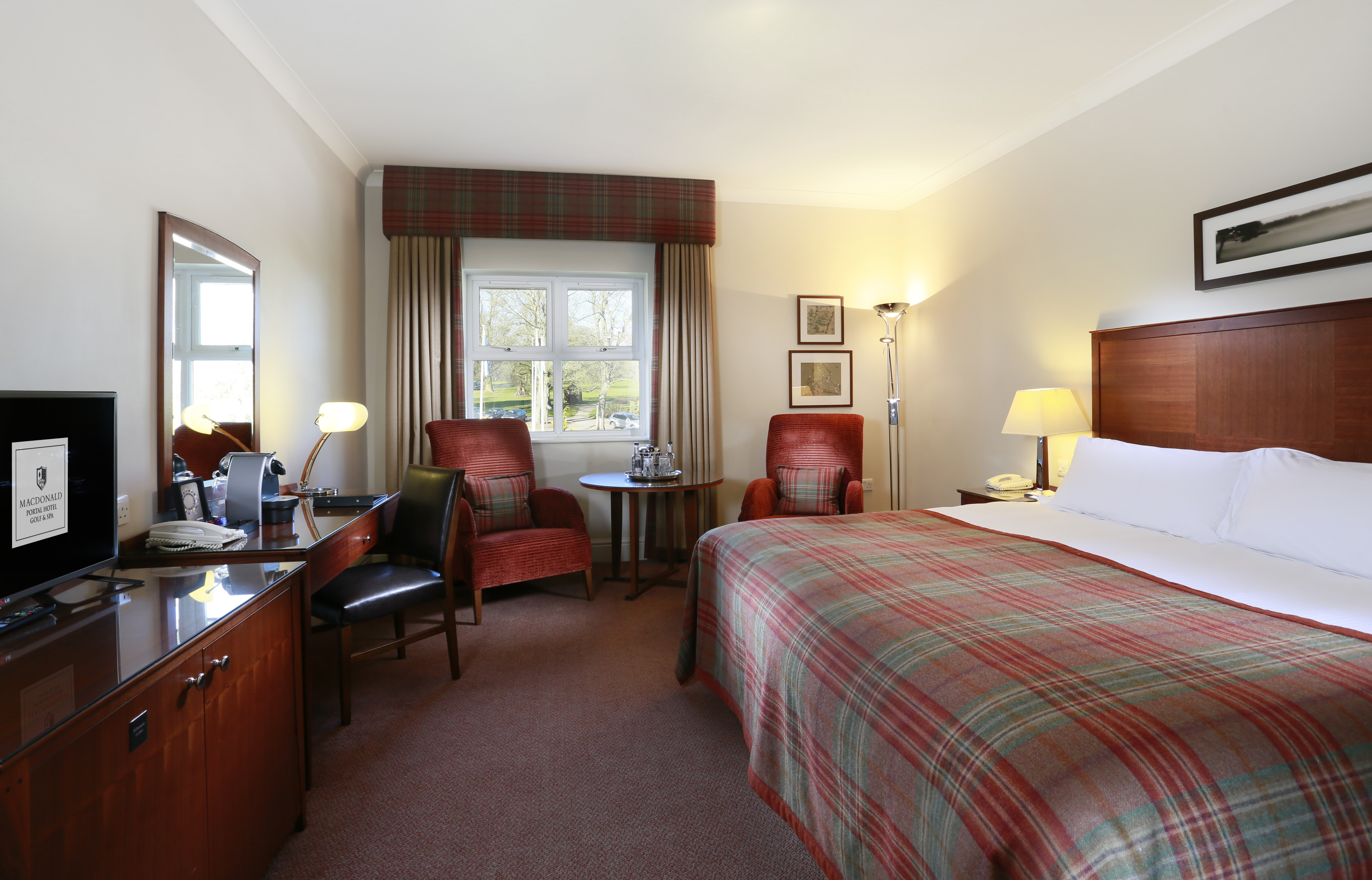 A Classic King bedroom at Portal Golf and Spa Resort
