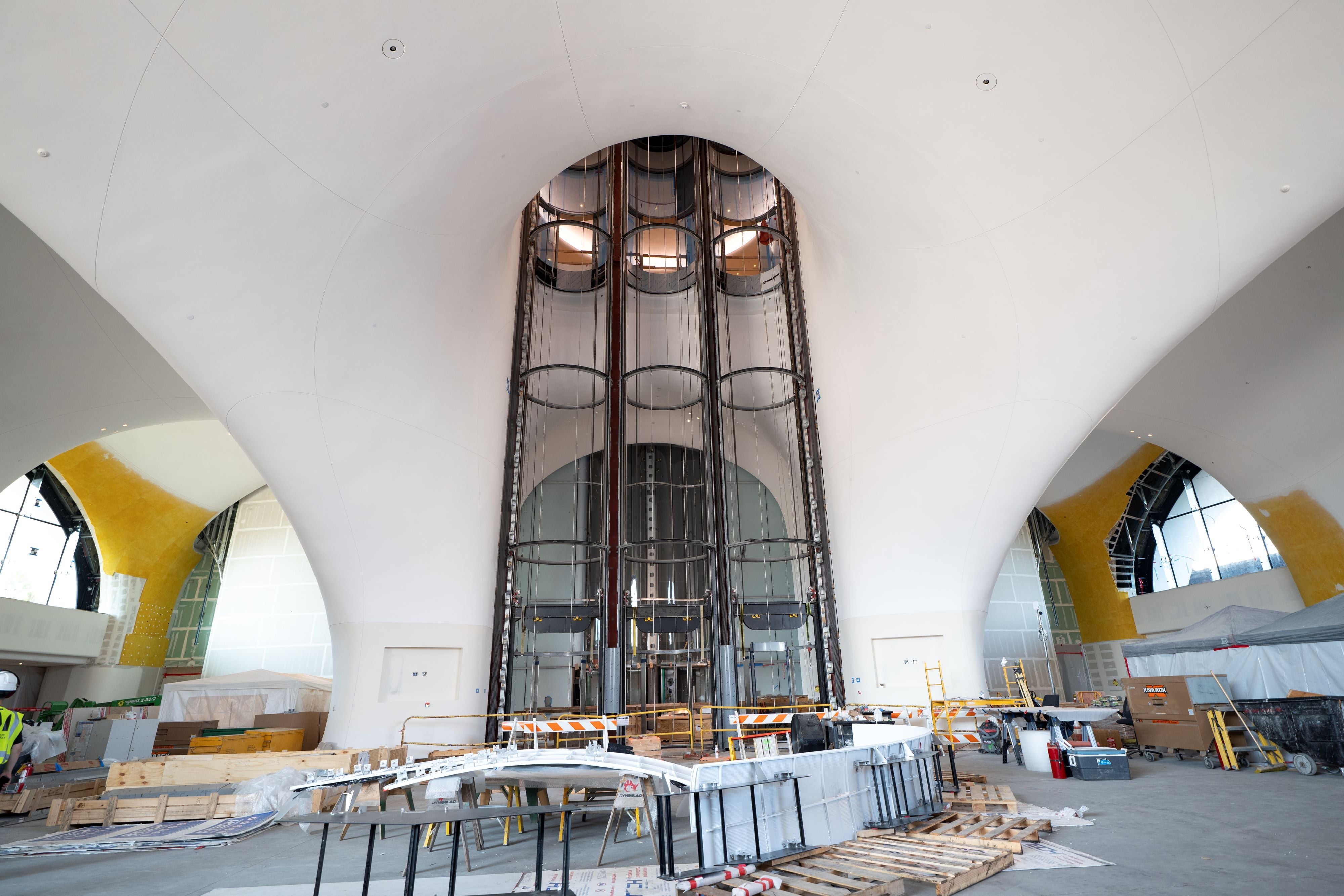 This image shows the museum's lobby, where glass lifts will take visitors to the upper levels
