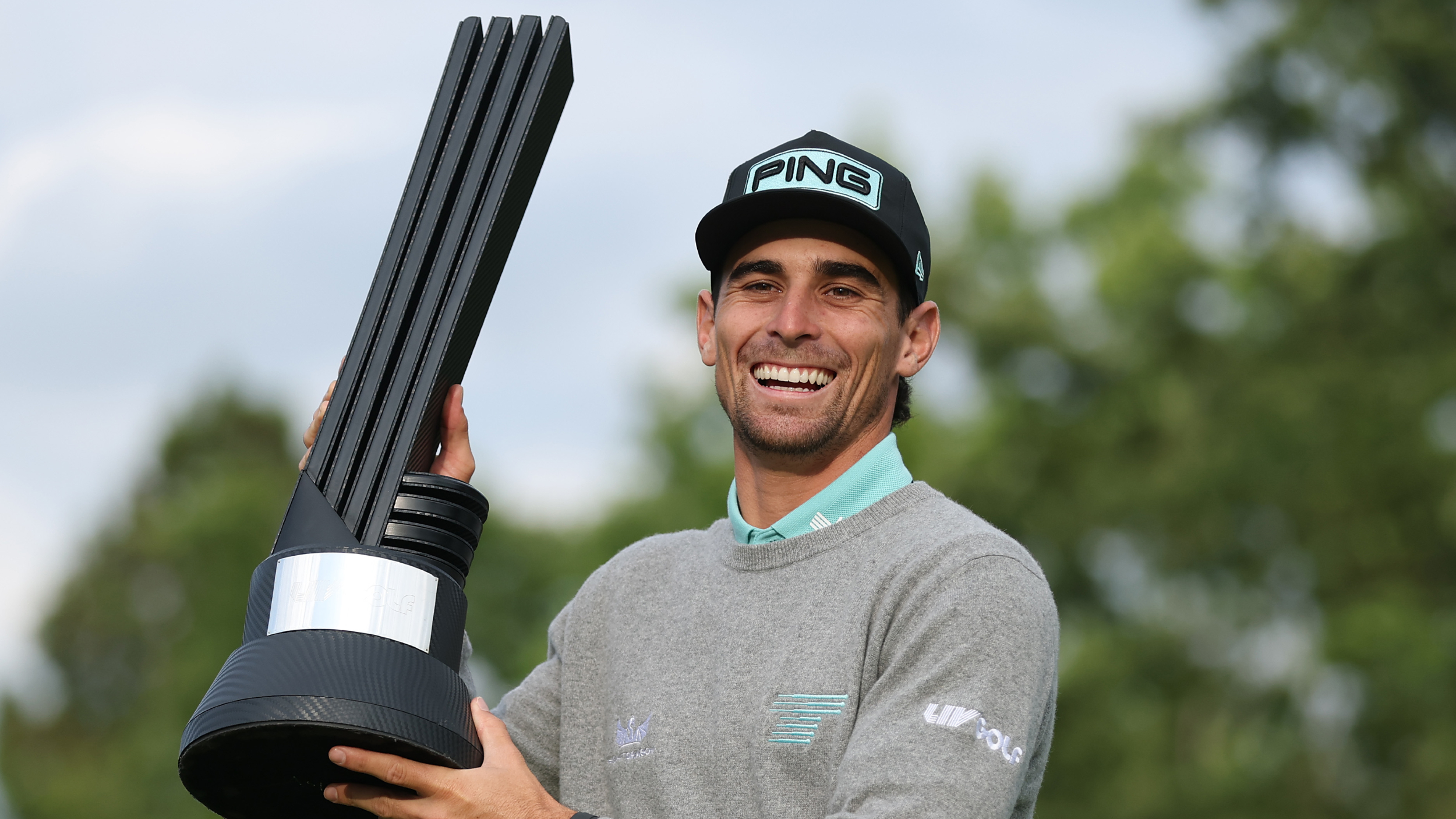 Joaquin Niemann with the LIV Golf UK trophy