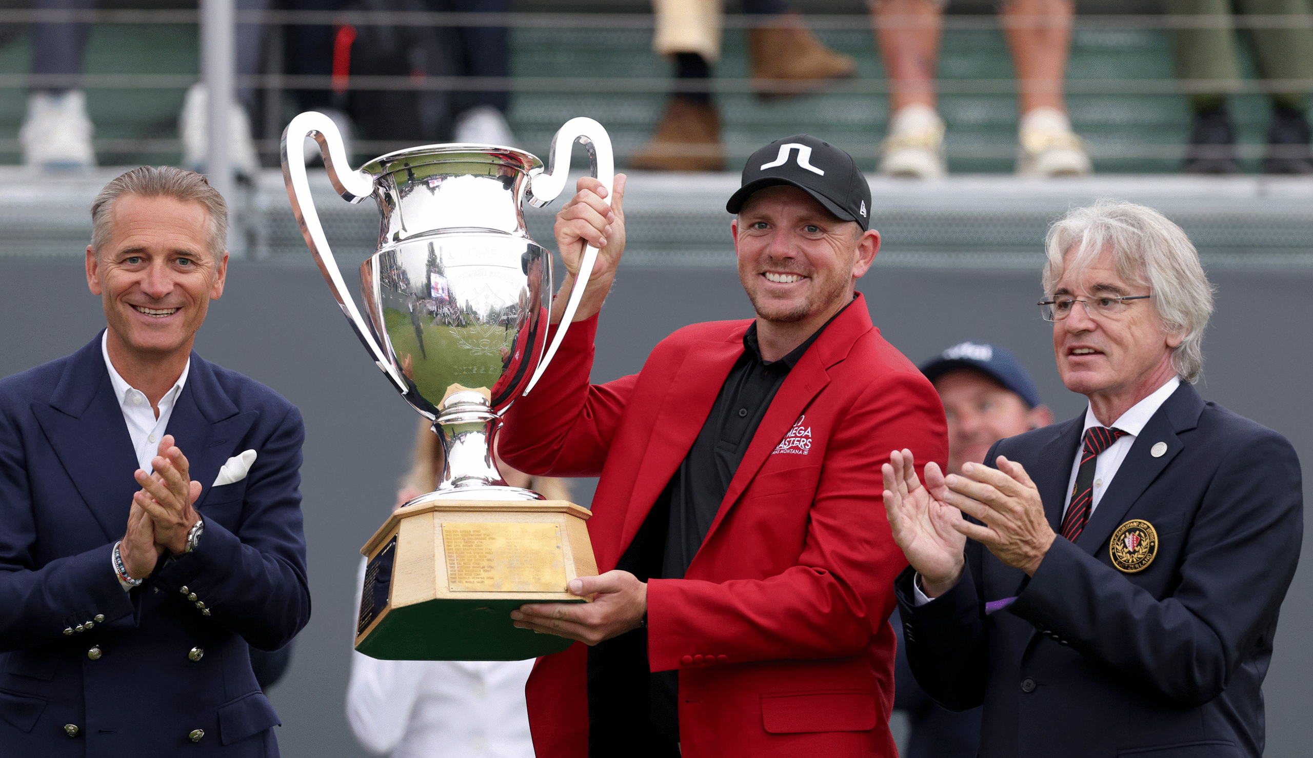 Matt Wallace holds the Omega European Masters trophy