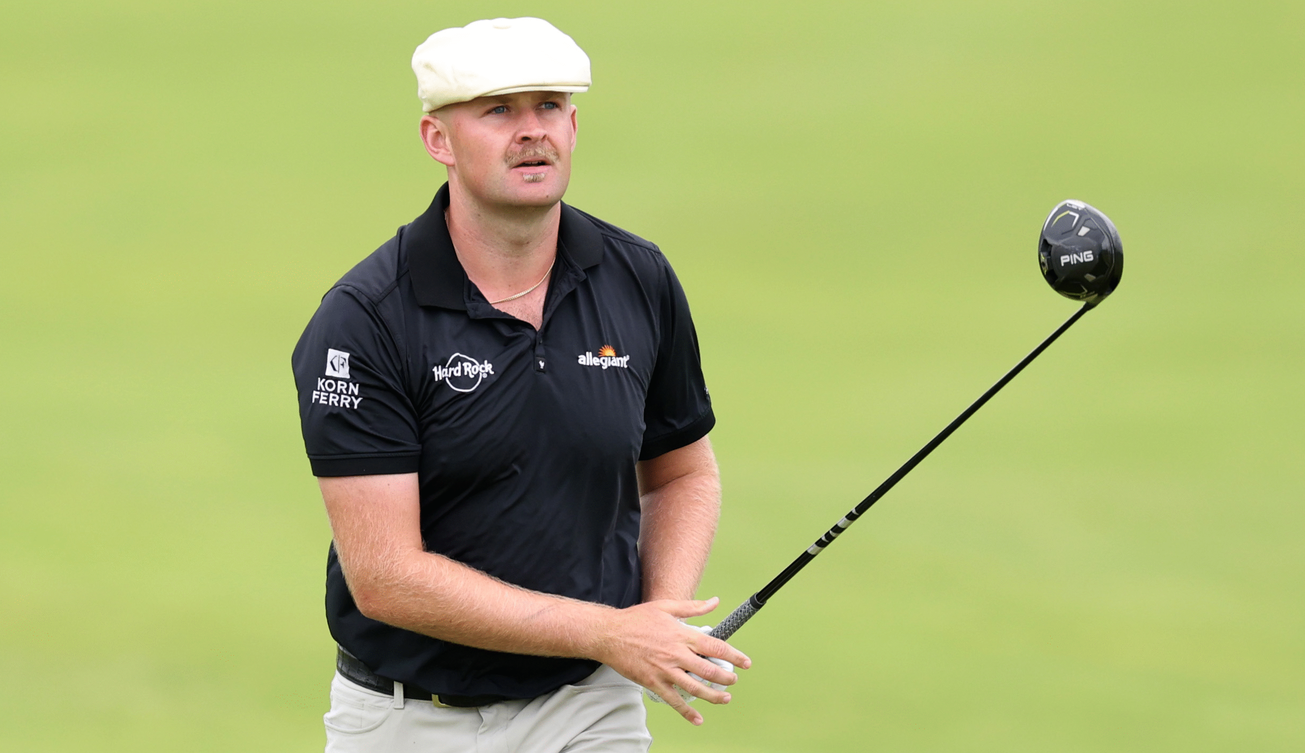 Harry Hall hits a driver and watches its flight