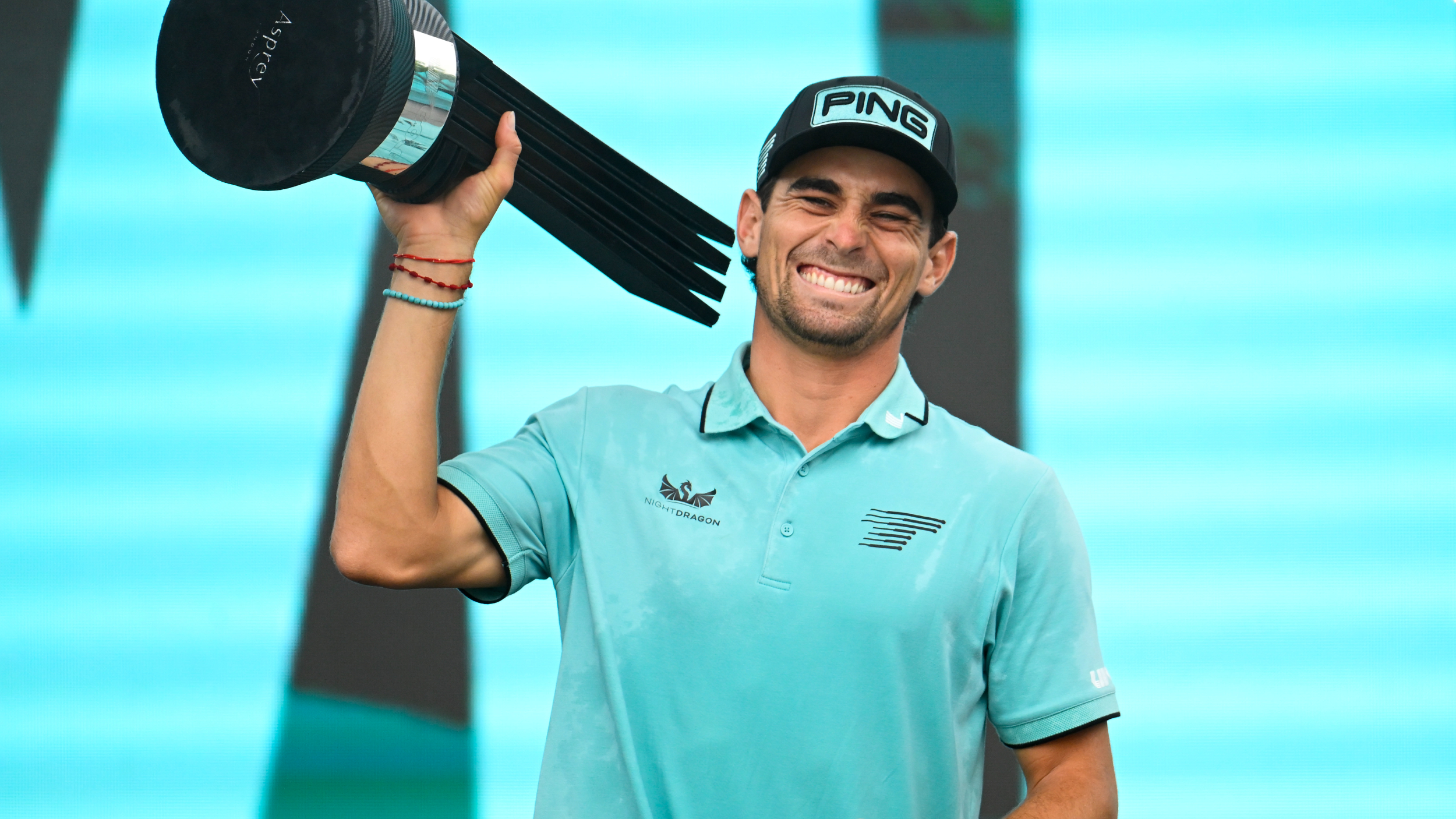 Joaquin Niemann with the LIV Golf Virginia trophy