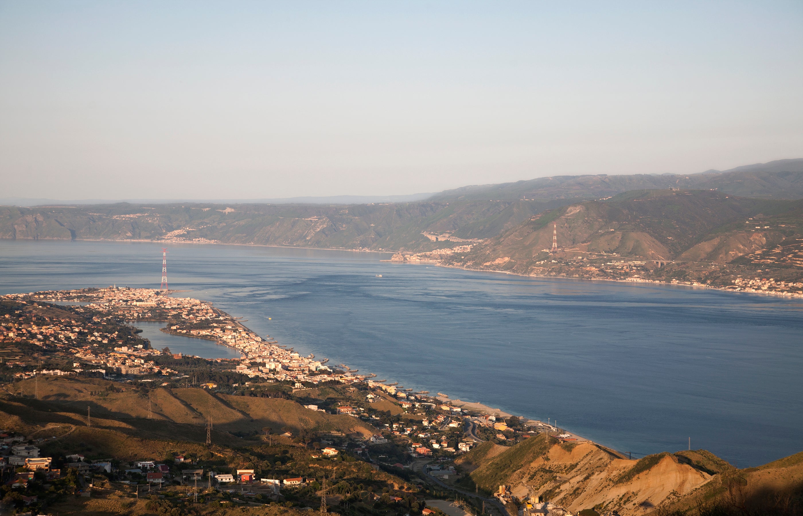 The strait of Messina at sunset in Sicily, Italy