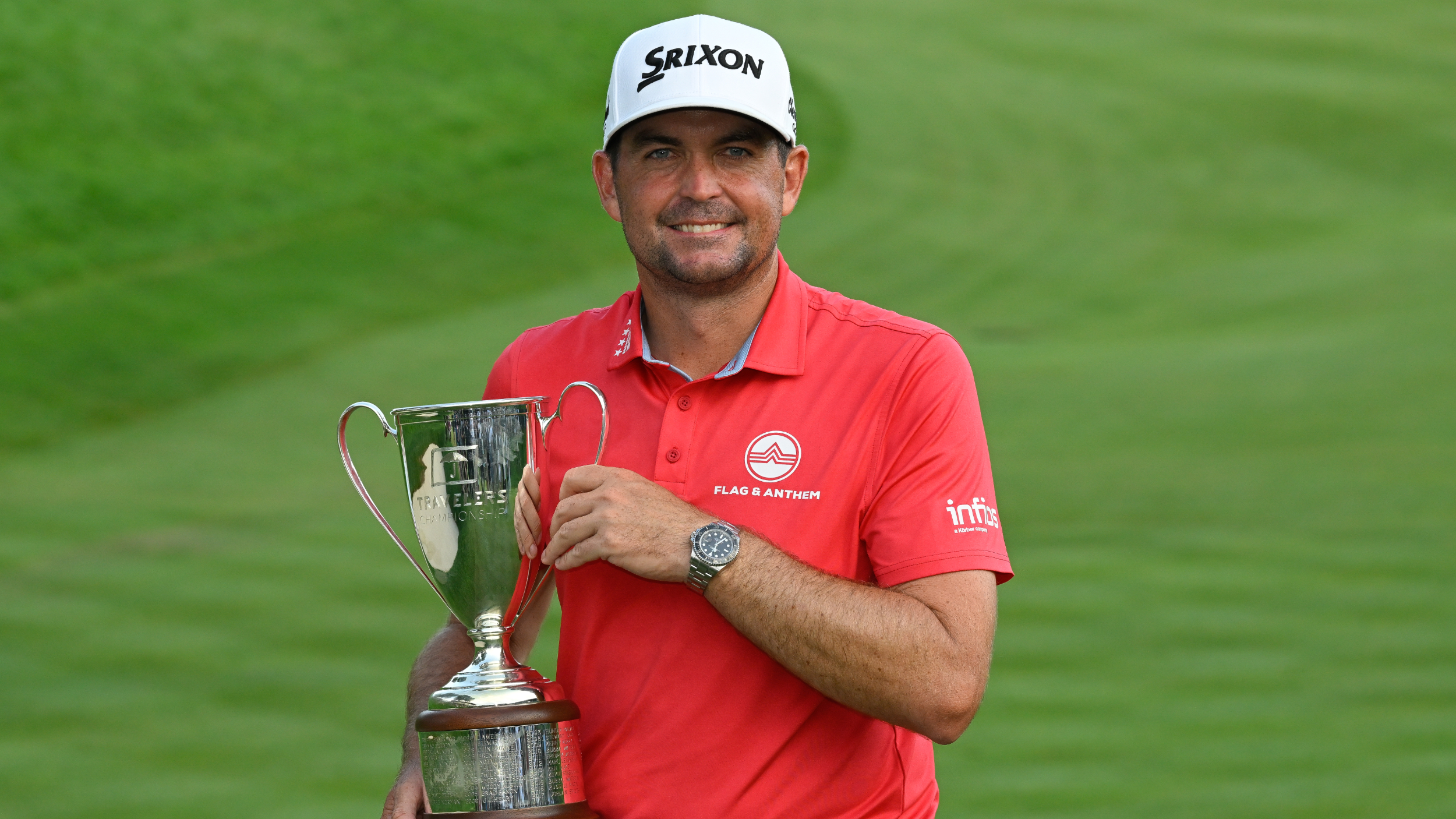 Keegan Bradley with the Travelers Championship trophy