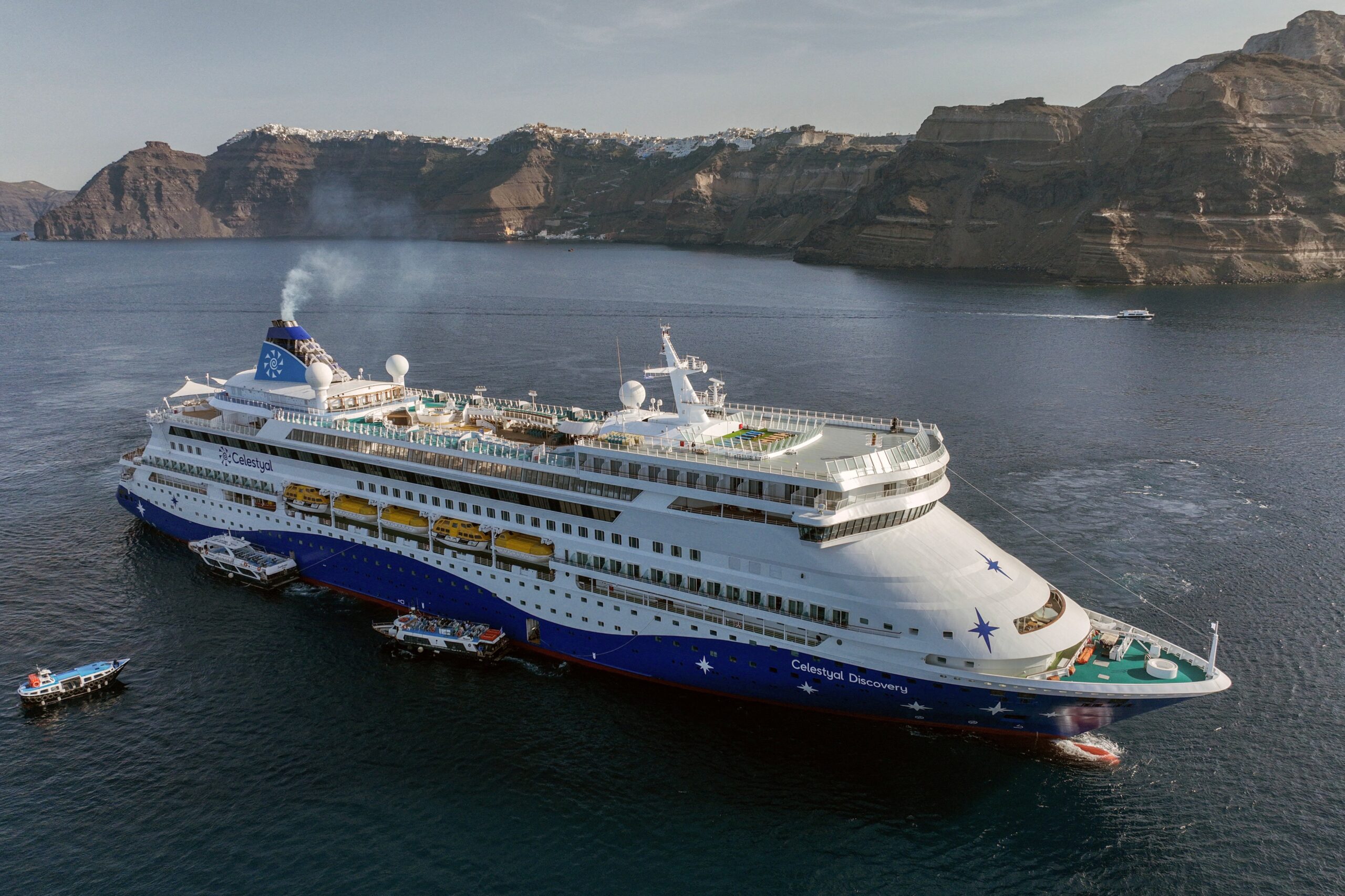 Cruise ship Celestyal Discovery arrives on the island of Santorini