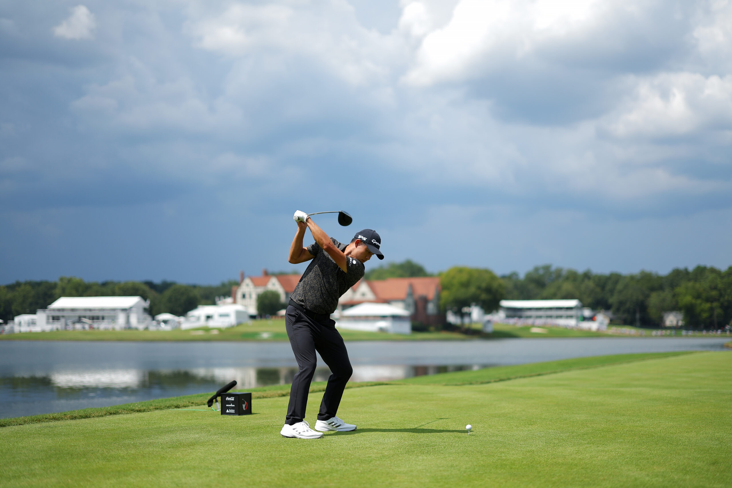 Collin Morikawa hits a driver at the Tour Championship