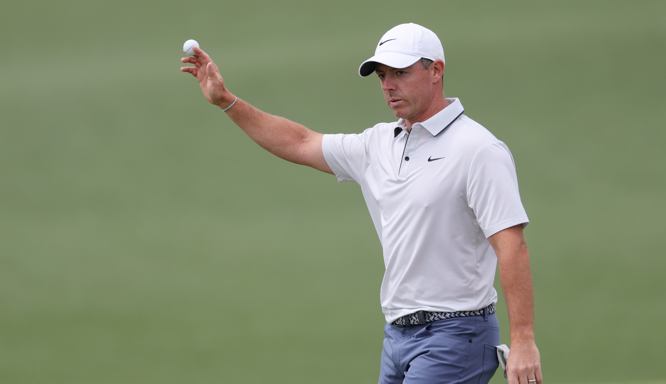 Rory McIlroy waves to the crowd